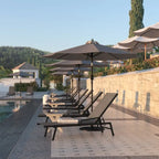 Chaise longue réglable en textilène toutes saisons avec accoudoirs