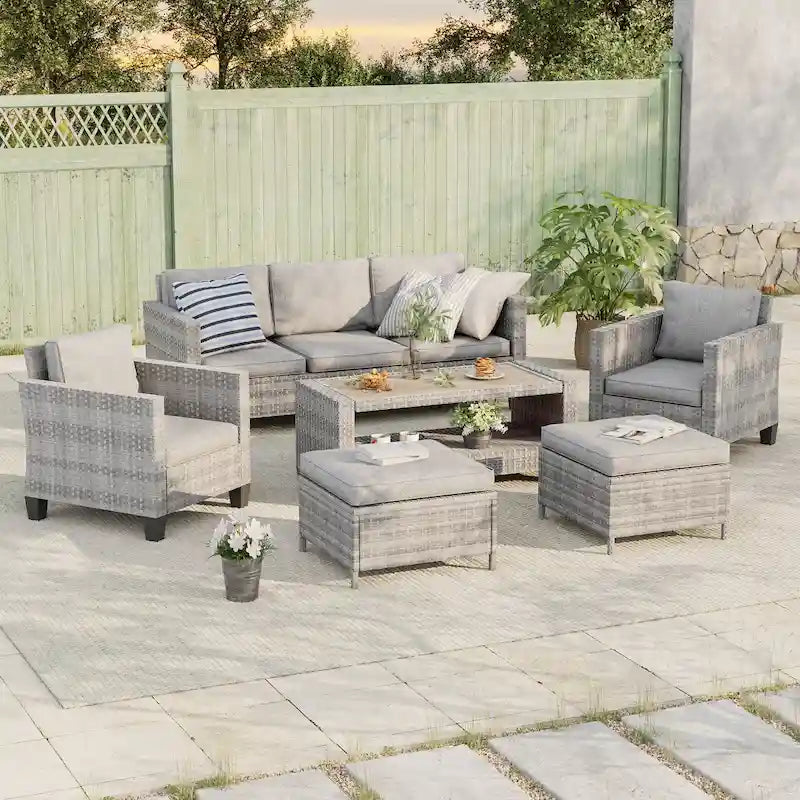 Ensemble de canapé de patio BONOSUKI 6 pièces en rotin gris avec poufs et table basse.