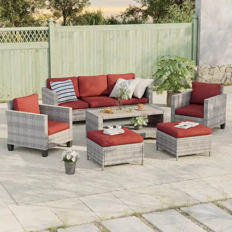 Ensemble de canapé de patio BONOSUKI 6 pièces en rotin gris avec poufs et table basse.