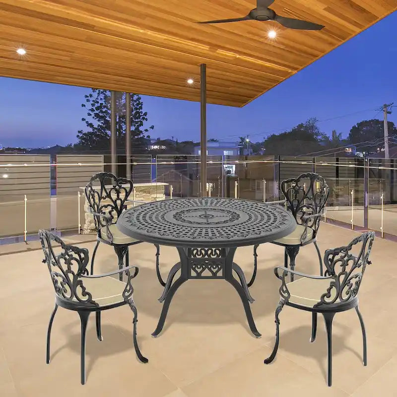 Ensemble de salle à manger d'extérieur en fonte d'aluminium 5/7 pièces avec table ronde de 120 cm et coussins de siège de couleur aléatoire