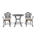 Ensemble de salle à manger d'extérieur 3 ou 5 pièces en fonte d'aluminium avec table ronde de 78 cm et coussins de couleur aléatoire